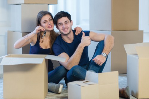 Student removals planning in Putney with moving boxes and local street setting