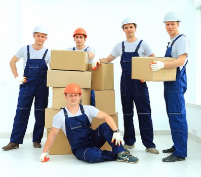 Putney moving service transporting boxes and household items