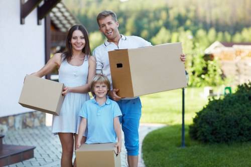 Careful packing of household belongings by movers in Putney