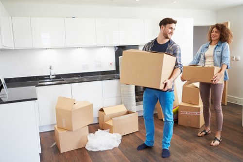 Mover assessing a loading area for hazards before lifting items