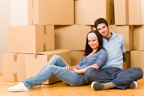 Professional Putney removals team packing boxes