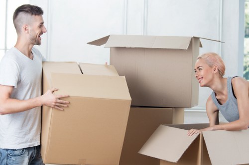 Professional Putney movers packing and preparing household items