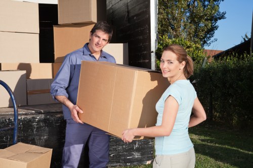 Furniture being loaded by removal companies in Putney